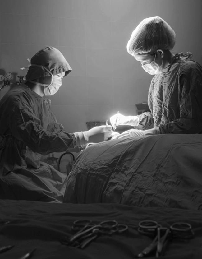 Surgeons operating